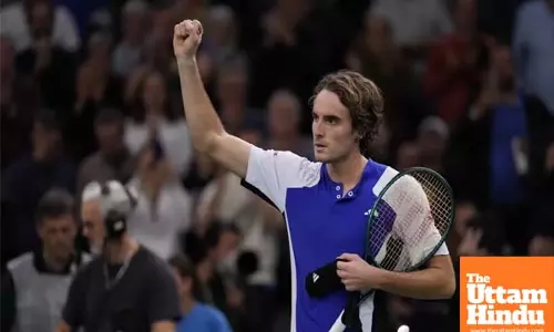 Tsitsipas overcomes stomach ache to win in Paris opener