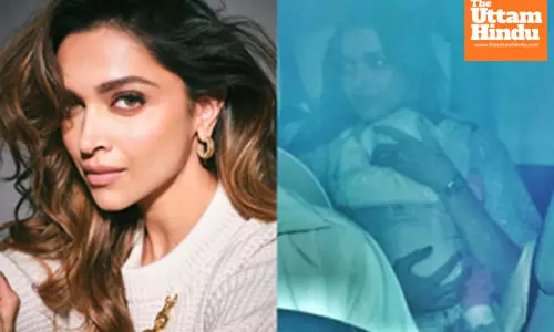 Deepika holds daughter Dua in her arms as they jet off for a family vacation