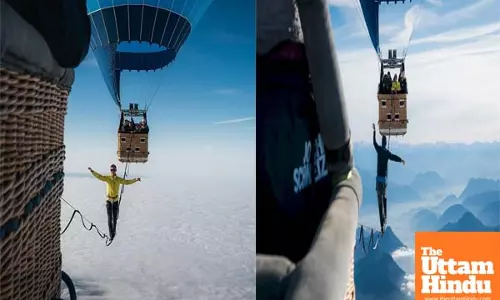 German athletes set new world record for slacklining between hot air balloons at 2,500 meters, WATCH VIDEO