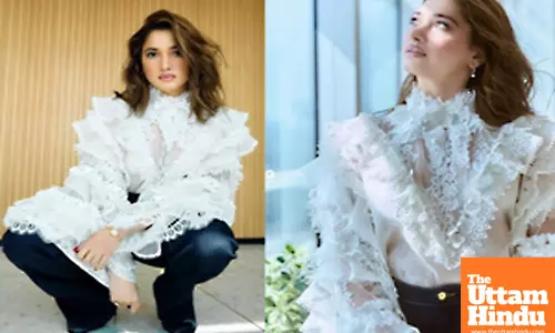 Tamannaah Bhatia goes classic as she stuns in white and blue