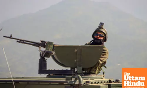 Imphal: Security personnel patrol in Armoured Tactical Vehicle at key locations on the periphery of Manipur