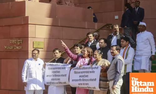 New Delhi: Congress MP Varsha Gaikwad and other MPs protest in the premises of Parliament over the alleged vandalising of a replica of the Indian Constitution in Maharashtras Parbhani