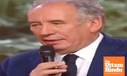 French PM unveils new cabinet, including two former prime ministers