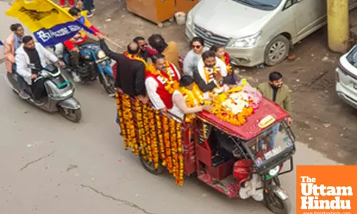 New Delhi: AAP candidate Vishesh Ravi campaigns for the upcoming Delhi Assembly elections