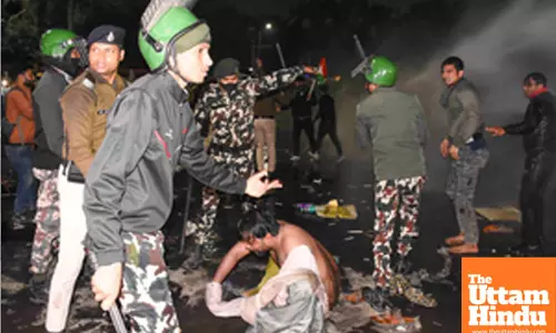 Patna: Police personnel baton-charge to disperse aspirants during their protest against the BPSC