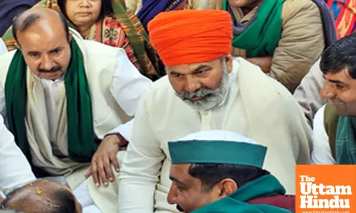 Greater Noida: Bharatiya Kisan Union leader Rakesh Tikait joins farmers at a Mahapanchayat