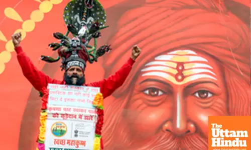 Prayagraj: A social worker gestures during the religious procession