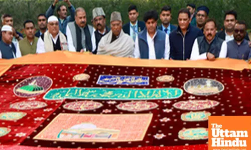 New Delhi: Congress President Mallikarjun Kharge hands over the ceremonial ‘Chadar’ on behalf of the Congress party
