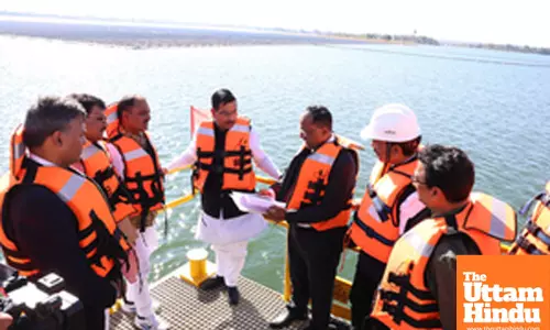 Khandwa: Union Minister Pralhad Joshi inspects the solar floating plant in Khandwa