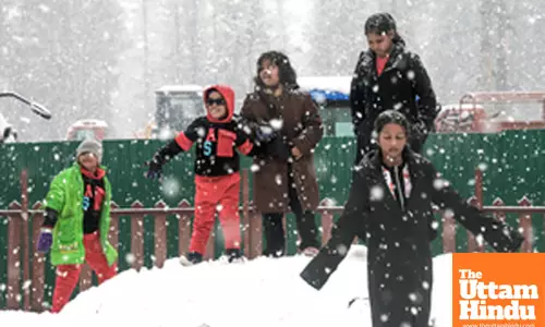 Baramulla: Children enjoy playing in the snow during heavy snowfall