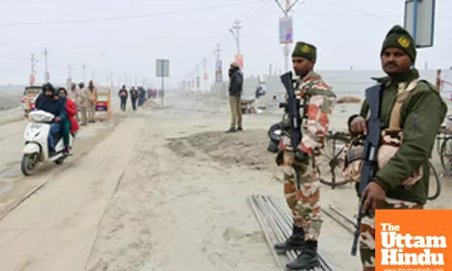 Prayagraj: Security personnel stand guard at the banks of the river Ganga ahead of the Maha Kumbh Mela 2025