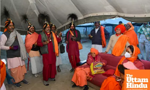 Prayagraj: Sadhus visit the camp at banks of the river Ganga ahead of the Maha Kumbh Mela 2025