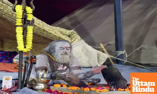 Prayagraj: A sadhu worships at his place at Panchayati Shree Niranjani Akhada Chaavni