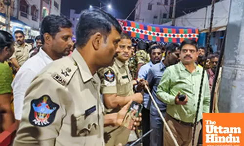 Tirupati: Police personnel stand guard at the token issuance centers, commemorating the Dwadashi of Vaikuntha Ekadashi
