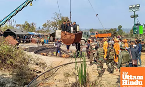 Dima Hasao: Indian Navy divers conduct a rescue operation to reach the trapped miners in Umrangso