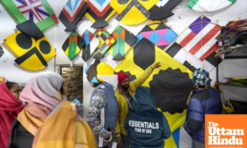 Amritsar: People buy kites at a shop ahead of the Lohri festival