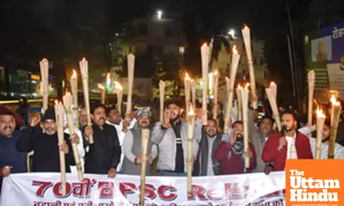 Patna: Jan Adhikar Party (JAP) workers take out a torch procession