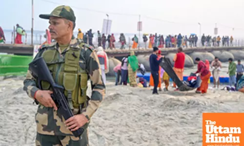 Prayagraj: Security personnel stand guard along the banks of the Sangam