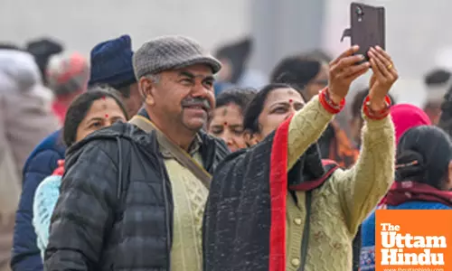 Prayagraj: People take a selfie at Sangam