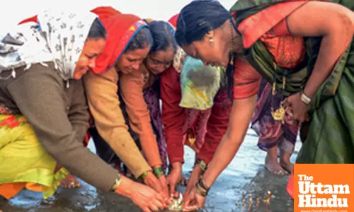 South 24 Parganas: Female devotees perform rituals at Gangasagar Island on a winter morning
