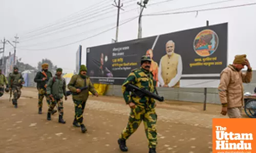 Prayagraj: Security personnel stand guard along the banks of the Sangam