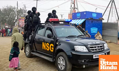 Prayagraj: National Security Guard (NSG) personnel patrols along the Triveni Sangam,