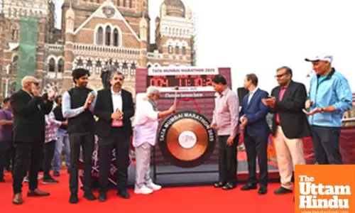 Striking the Gong in support of landmark 20th edition of Mumbai Marathon