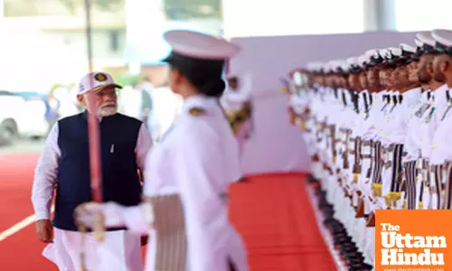 Mumbai: PM Narendra Modi inspects the Guard of Honour at the Naval Dockyard