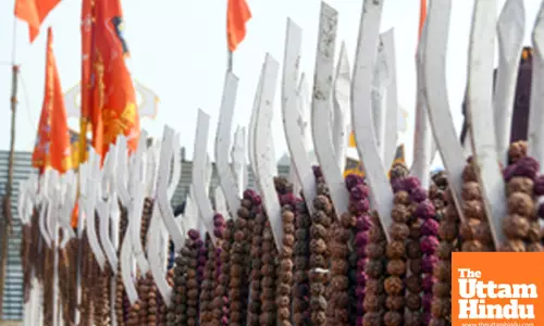 Prayagraj: Rows of tridents adorned with Rudraksha beads displayed during the Maha Kumbh Mela 2025