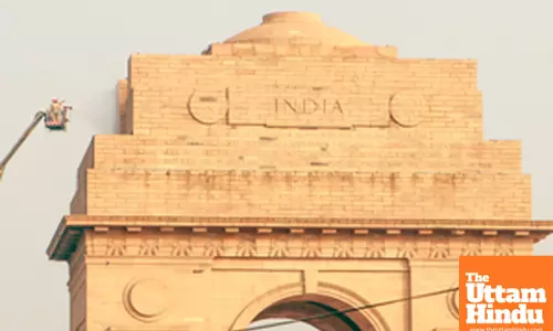 New Delhi: Delhi Fire Service personnel clean the India Gate as part of preparations for Republic Day 2025
