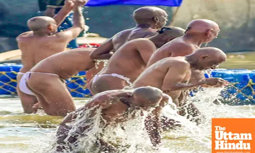 Prayagraj: Newly initiated Naga Sadhus take a ritual bath at the Sangam during the Maha Kumbh Mela 2025