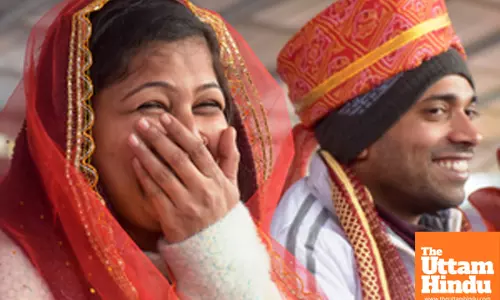 Moradabad: A Newly-wed couple smile with joy during the Mukhyamantri Samuhik Vivah Yojana ceremony