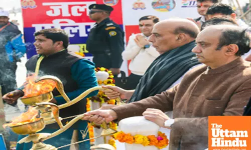 Prayagraj: Defence Minister Rajnath Singh and BJP Rajya Sabha MP Sudhanshu Trivedi perform the Ganga Aarti at the Triveni Sangam
