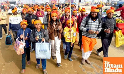 Prayagraj: Devotees take part in a religious procession at the Triveni Sangam