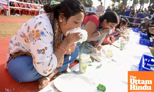 Patna: Participants take part in the “Dahi Khao” curd-eating competition