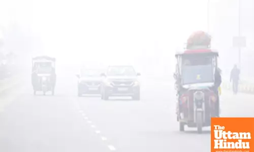 Jaipur: Vehicles move through dense fog on a cold winter evening in Jaipur