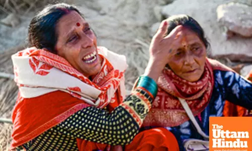 Prayagraj: Women mourn the loss of their belongings following a fire at a camp during the Maha Kumbh Mela 2025