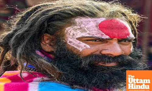 Prayagraj: A sadhu sits at his camp at the Sangam during the Maha Kumbh Mela 2025
