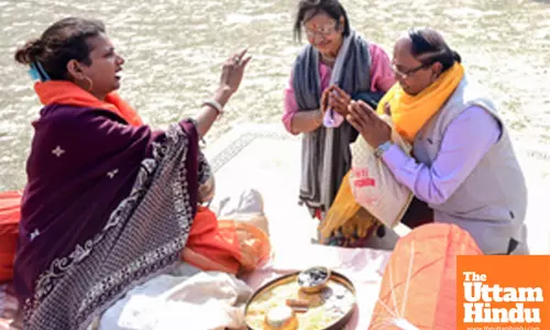Prayagraj: Devotees seek blessings from a kinnar sadhu during the Maha Kumbh Mela 2025