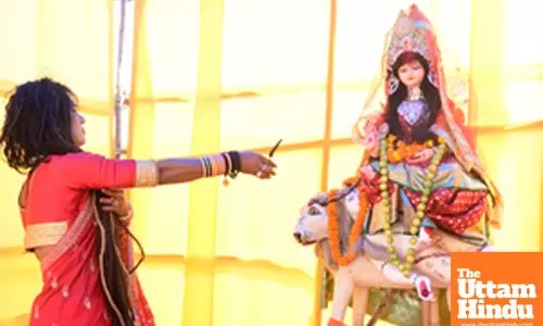 Prayagraj: A kinnar sadhu offers prayers during the Maha Kumbh Mela 2025 at the Sangam