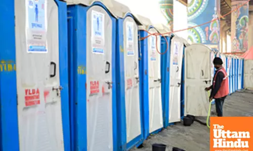 Prayagraj: Worker Maintains Hygiene at Kumbh Mela