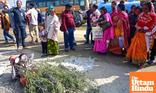 Prayagraj: Kaante Wale Baba lies on a bed of thorns as devotees gather around during the Maha Kumbh Mela 2025