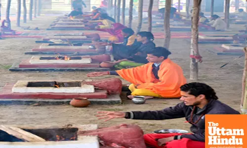 Prayagraj: Sadhus (holy men) perform Havan at Triveni Sangam