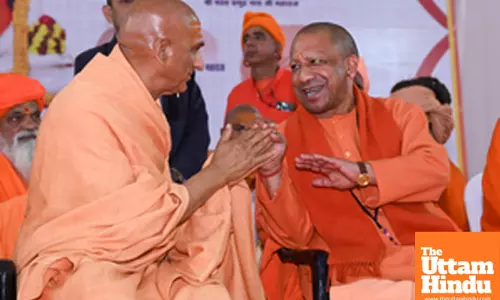 Prayagraj: Uttar Pradesh Chief Minister Yogi Adityanath with Acharya Mahamandaleshwar Swami Avdheshanand Giri Maharaj of Juna Akhara