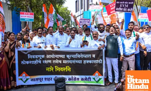 Nagpur: Congress workers stage a protest against EVMs on the occasion of National Voters Day