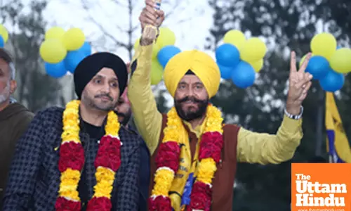 New Delhi: AAP Rajya Sabha MP Harbhajan Singh leads a roadshow in support of AAP candidate Jitender Singh Shunty