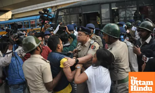Kolkata: Students Federation of India (SFI) activists participate in a protest march against the State Government