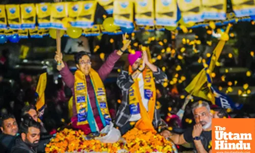 New Delhi: Delhi Chief Minister Atishi and Former Indian cricketer and AAP Rajya Sabha MP Harbhajan Singh hold a roadshow