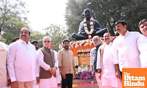 Telangana Guv, CM Reddy pay tributes to Mahatma Gandhi at Bapu Ghat