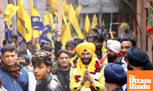 New Delhi: Aam Aadmi Party (AAP) candidate from Shahdara assembly constituency Jitender Singh Shunty campaigns door-to-door